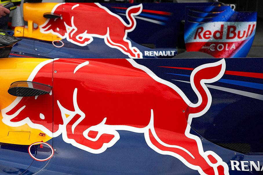 Two prancing Red Bulls in parc ferme