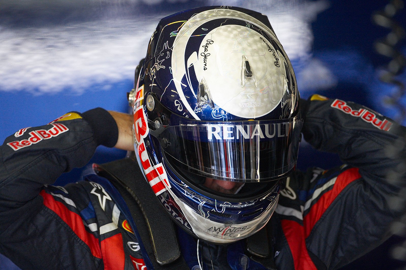 Sebastian Vettel, Red Bull Racing, puts his helmet on