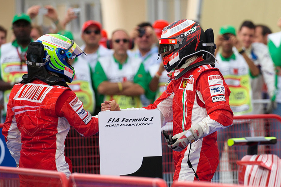 Ferrari team mate handshake between winner Massa and second placed Raikkonen