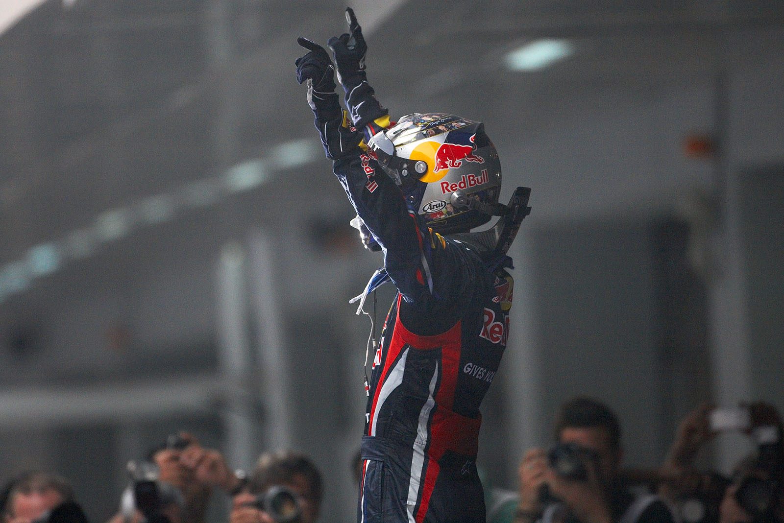 Race winner Sebastian Vettel of Red Bull Racing celebrates in parc ferme