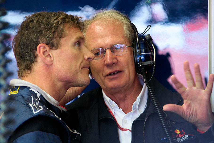 Red Bull's advisor Dr. Helmut Marko speaks with gestures to David Coulthard
