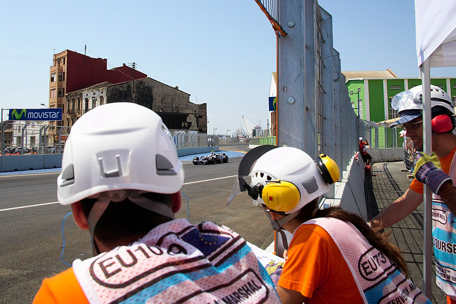 Marshals watch Nakajima racing