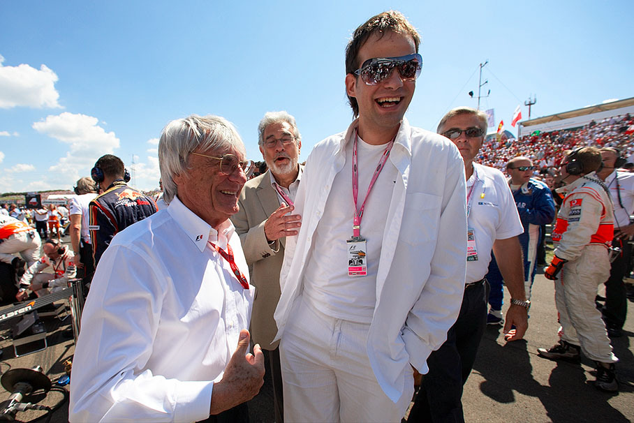 Opera singer Placido Domingo (middle) with Bernie Ecclestone and an incognito VIP