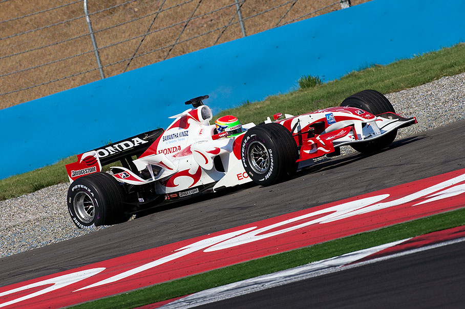 Super Aguri's second driver Sakon Yamamoto digging in the gravel after a  spin