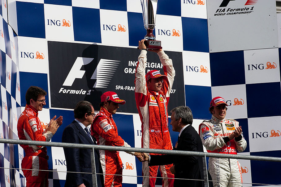 Winner Kimi Raikkonen on podium with the second placed Felipe Massa and the third Fernando Alonso.