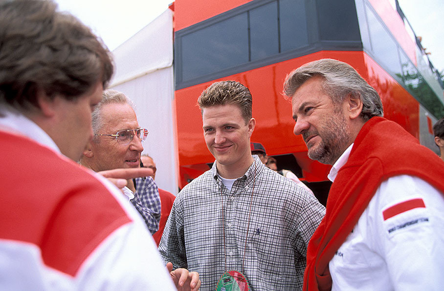 Ralf Schumacher with his manager Willi Weber, in discussion with Mercedes executives Hubbert and Haug