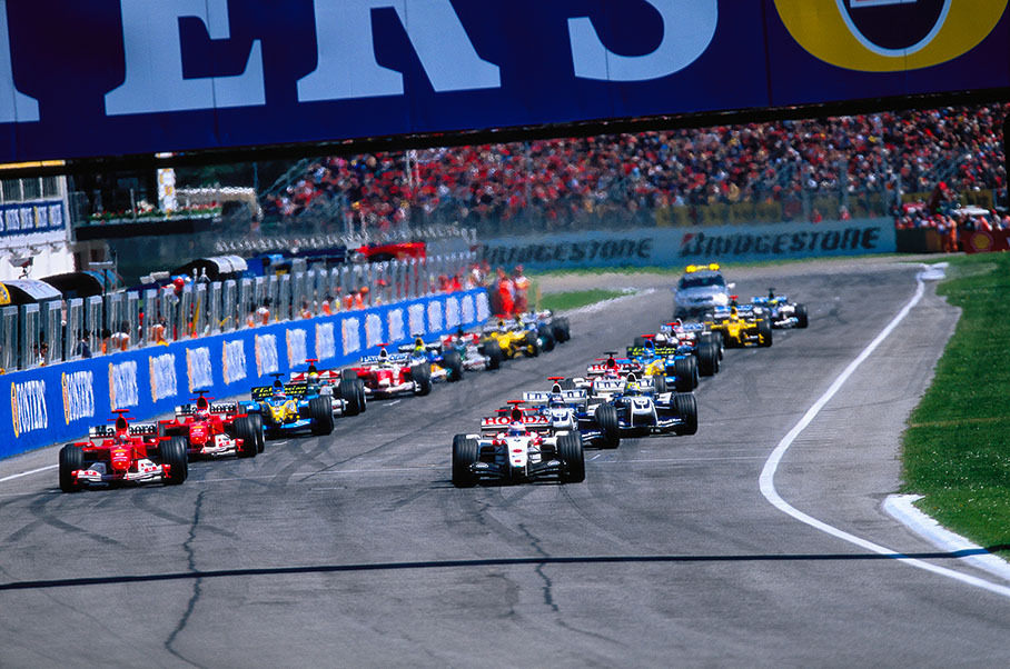The start of the San Marino Grand Prix 2004 - Jenson Button (BAR-Honda, No. 9) starts from pole position, alongside Michael Schumacher (Ferrari, No. 1).