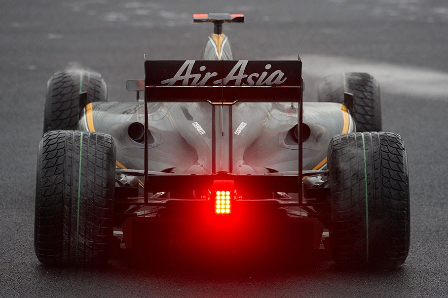 Jarno Trulli, Lotus Racing, continues to race after having spun out
