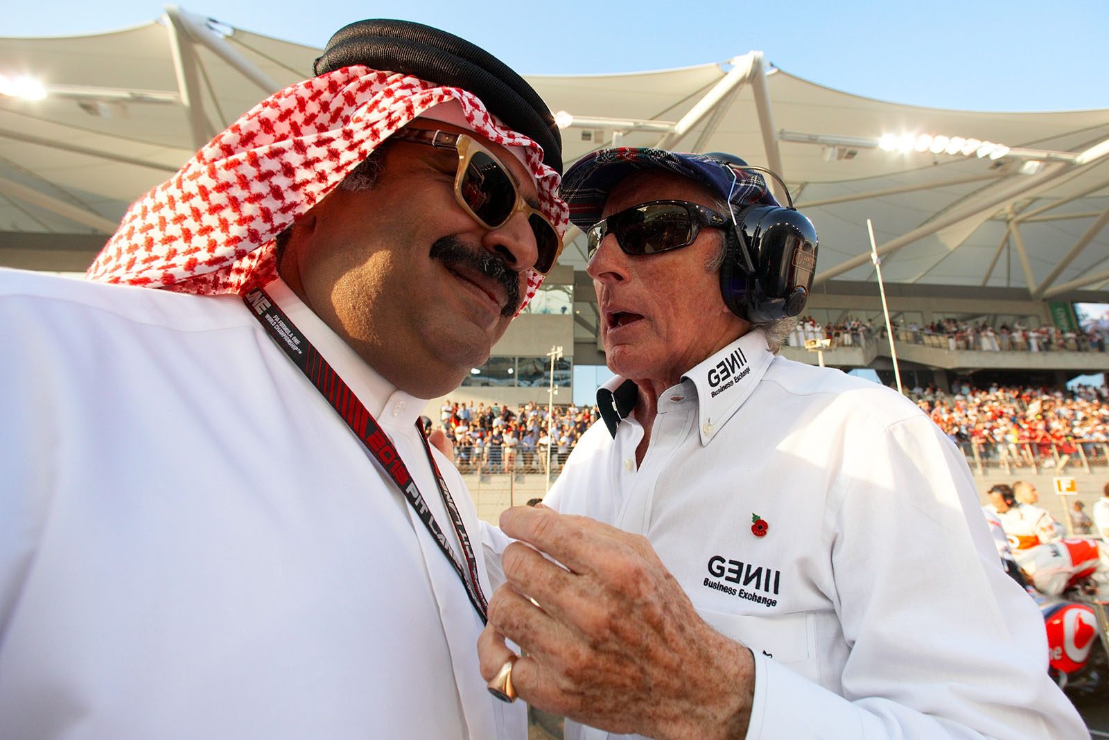 Sheikh Fawaz bin Mohammed Al Khalifa, Bahrain minister of state for communications, and Jackie Stawart, on the grid
