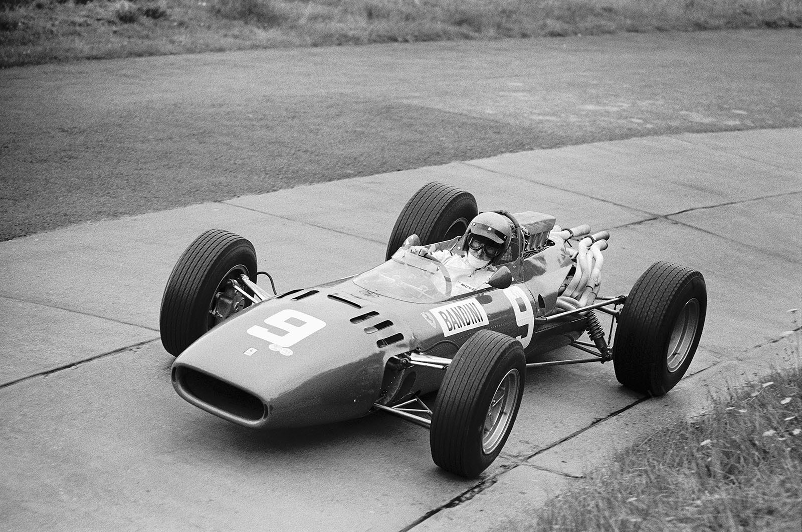 Lorenzo Bandini, Ferrari 312, driving through the Karussell, German Grand Prix, Nurburgring, 1966