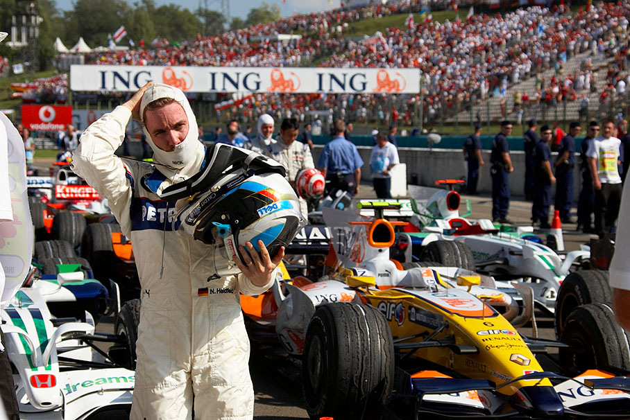 A thoughtful Nick Heidfeld leaves the parc ferme of the further arrivers