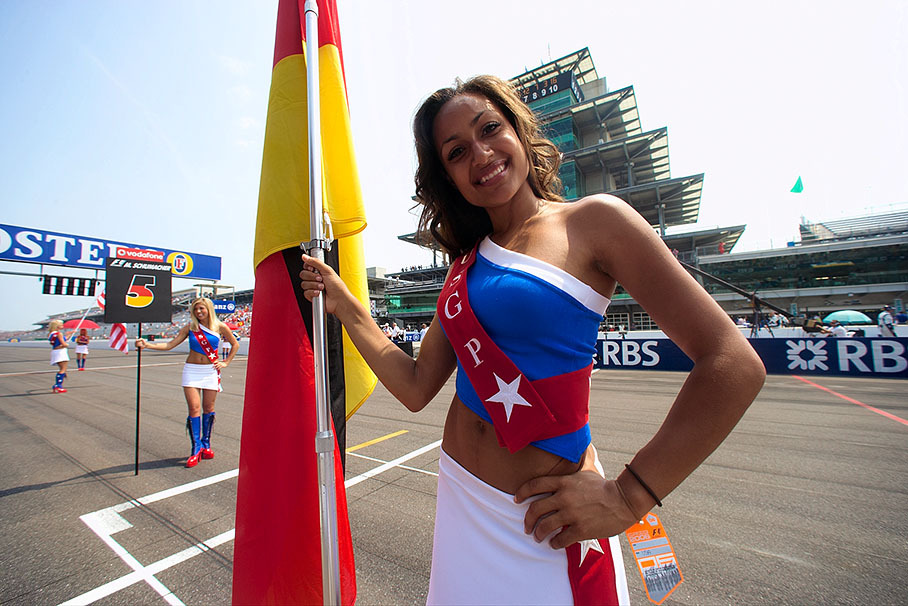 Grid girls awaiting Michael Schumacher at his starting place