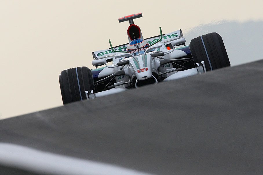 Honda driver Jenson Button at pitlane exit on Friday afternoon practice session