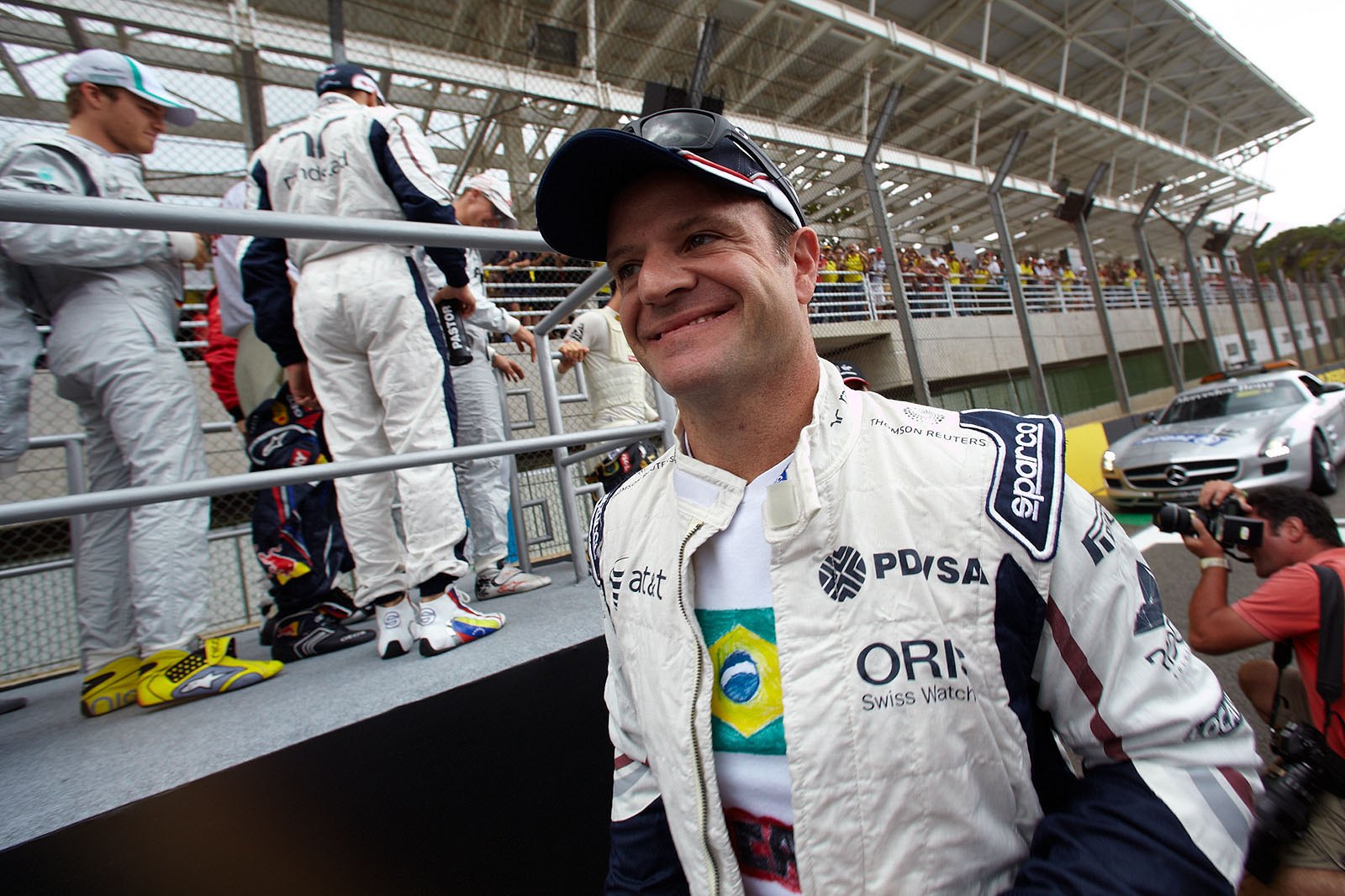 Rubens Barrichello, local hero and the driver that has started the most Grands Prix in the field, obviously enjoyed his (probably last) drivers parade in F1 and the cheering fans around the race track
