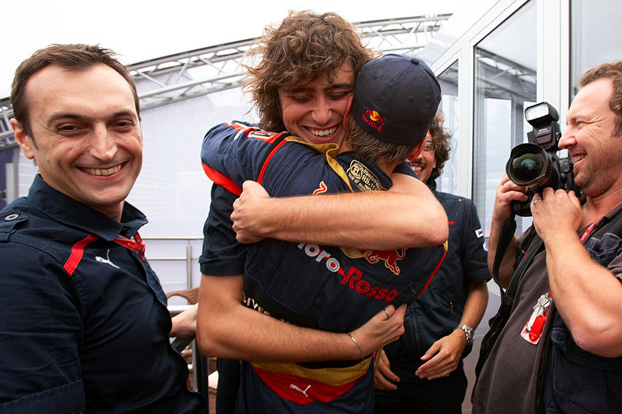 Pure joy amongst the mechanics as Vettel embraces them all
