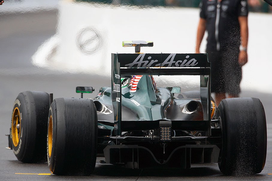 Heikki Kovalainen at Lotus Racing pits