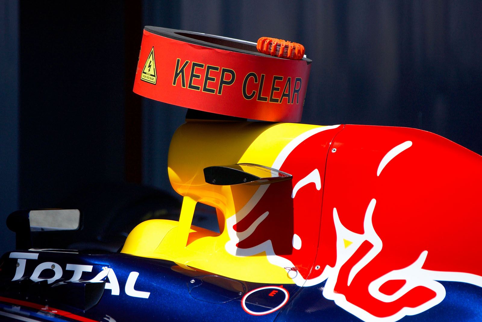 The Red Bull-Renault car fitted with KERS high voltage warning.