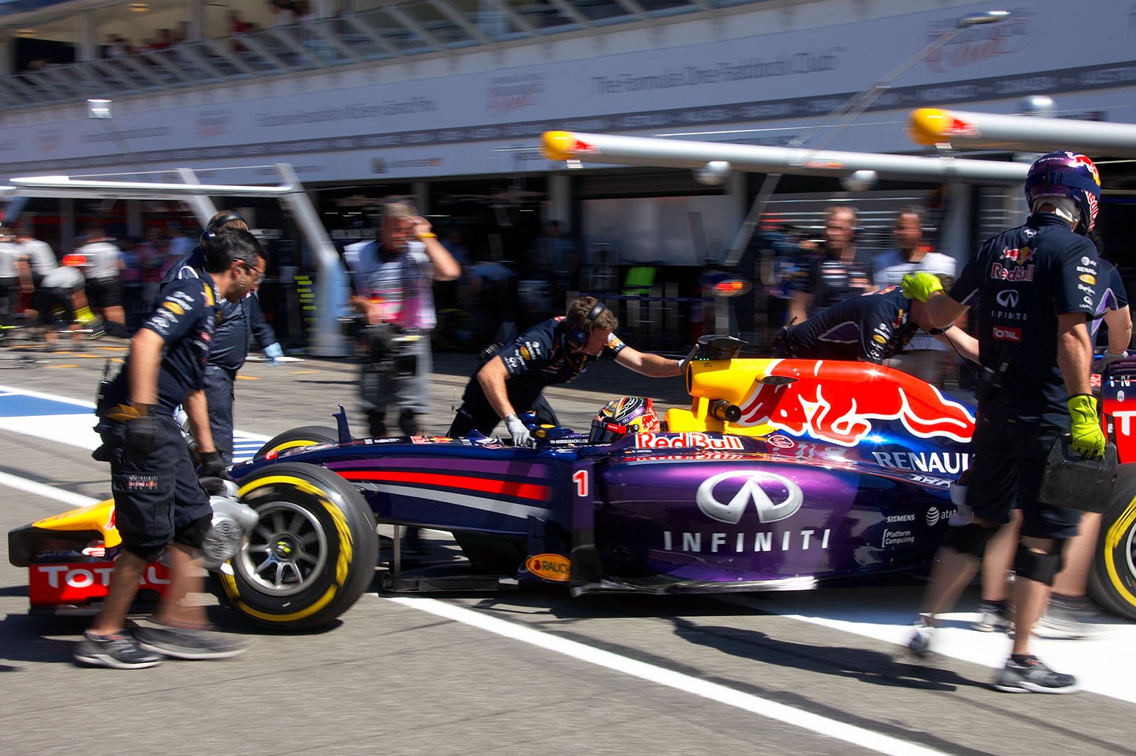 Sebastian Vettel, Red Bull-Renault, back to the pits during Friday morning practice session, Hockenheim, German Grand Prix, 2014