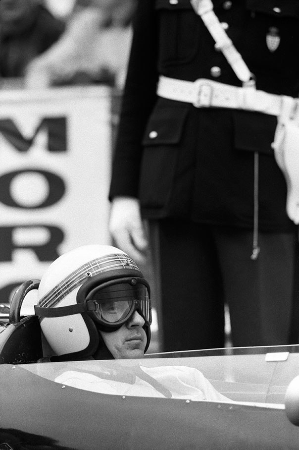 Jackie Stewart sits in a Formula 2 car, Monaco 1964