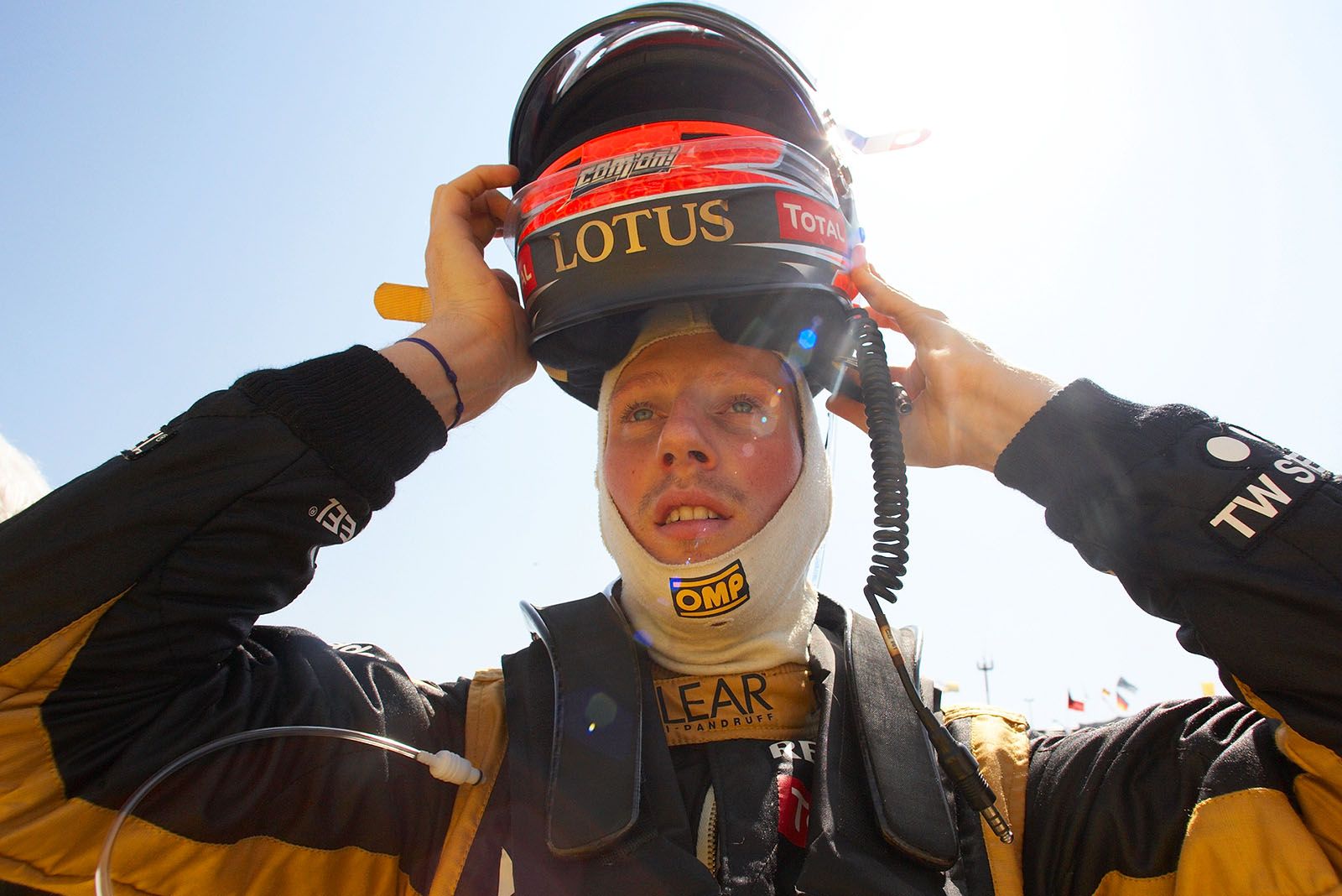 Romain Grosjean, Lotus, puts his helmet on before the Hungarian Grand Prix
