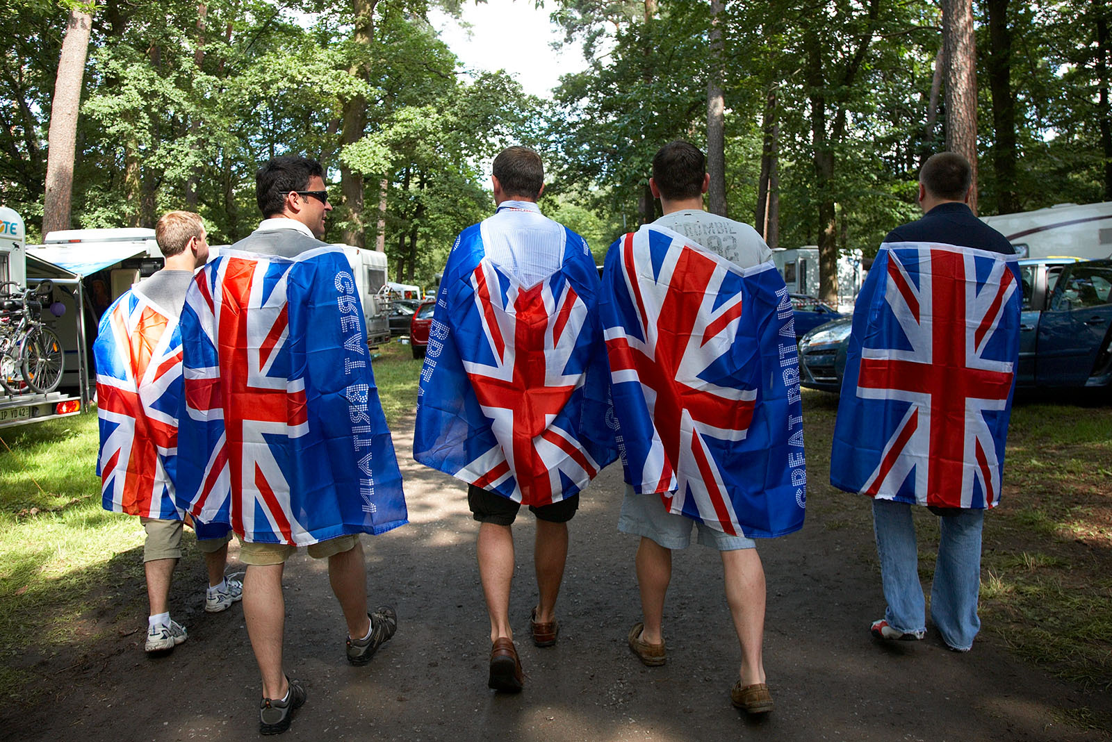 British race fans walk in the woods to the Hockenheim race track