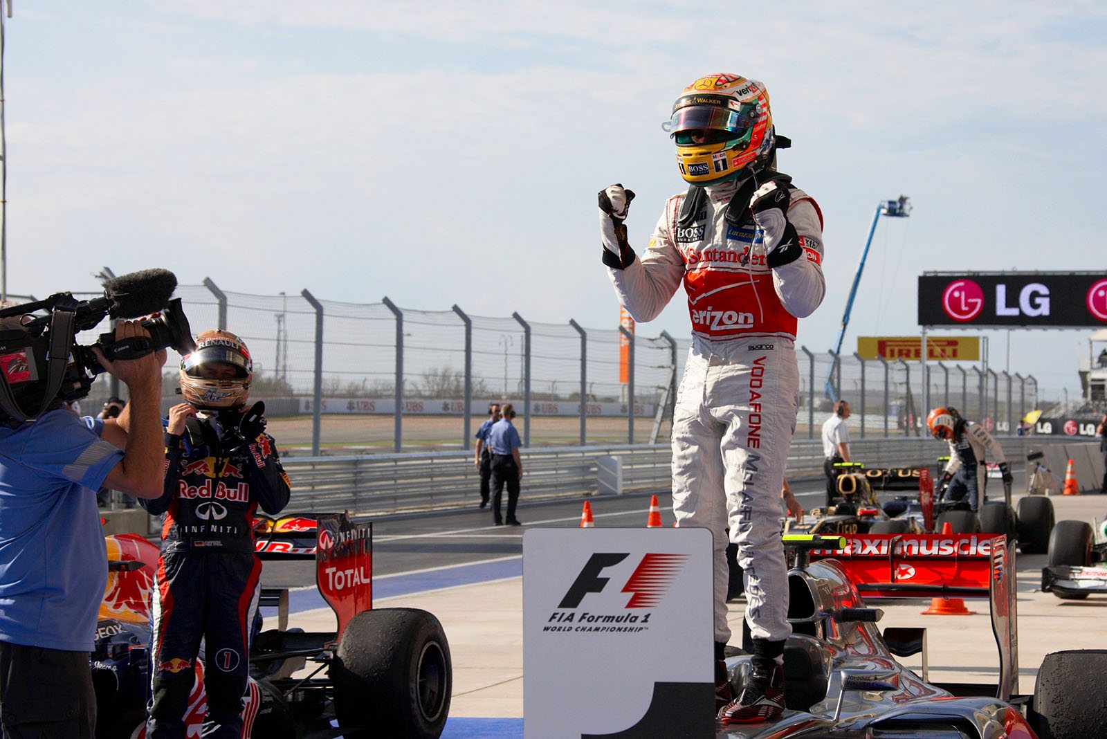 Race winner Lewis Hamilton, McLaren Mercedes, celebrates his achievement in parc ferme