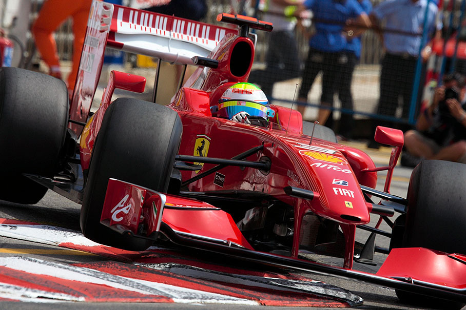 Felipe Massa's Ferrari flys overover the curbs