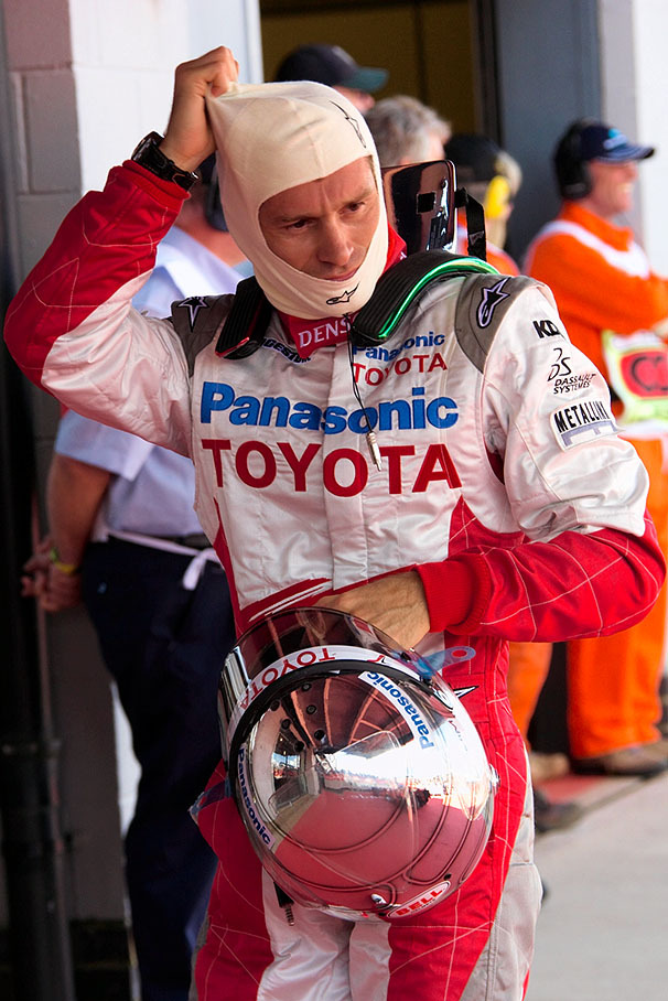 Jarno Trulli takes his balaclava off after qualifying session
