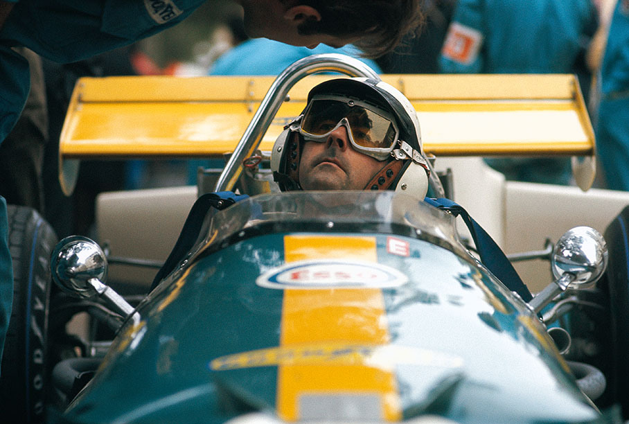 World Champion of 1959, 1960 and 1966 Jack Brabham sits in his own Brabham-Cosworth BT33