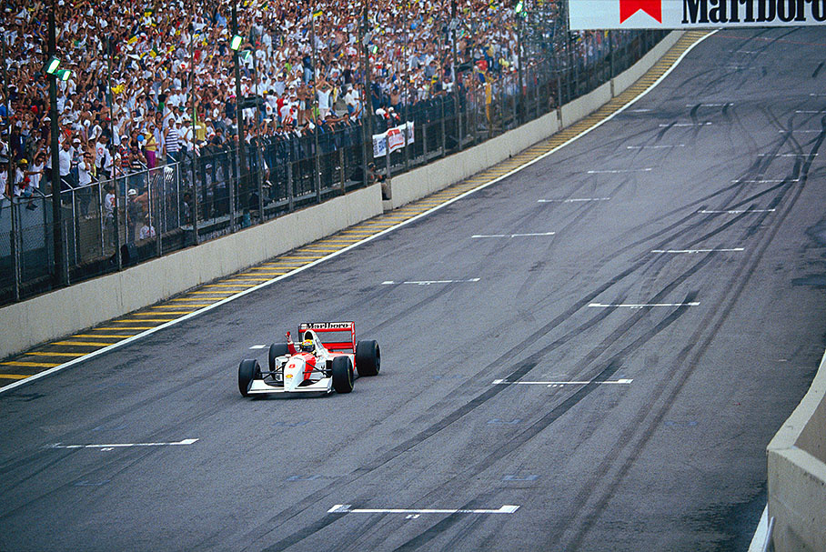 Ayrton Senna wins the Brazilian GP at Interlagos in which the new F1 Safety Car was sent out after a huge rain storm. It's McLaren's 100th victory in F1.