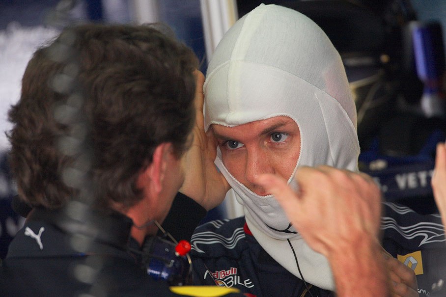 Sebastian Vettel in pits with Red Bull Racing team principal Christian Horner