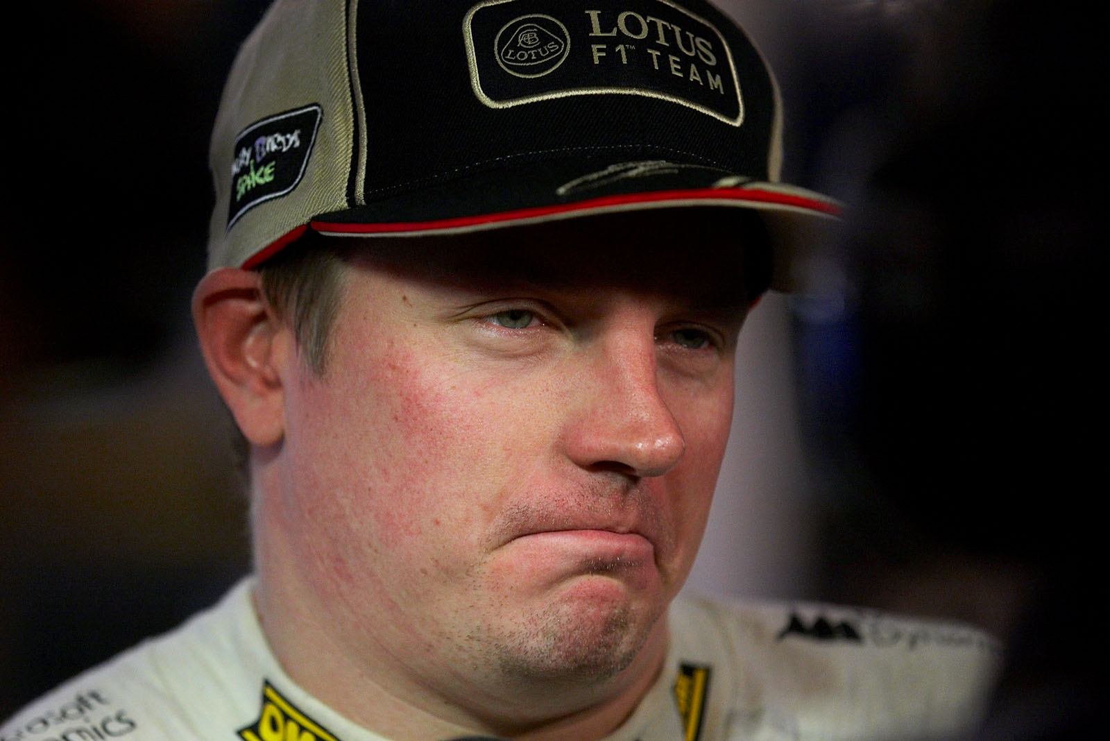 Race winner Kimi Raikkonen of Lotus gives an interview after the Abu Dhabi Grand Prix