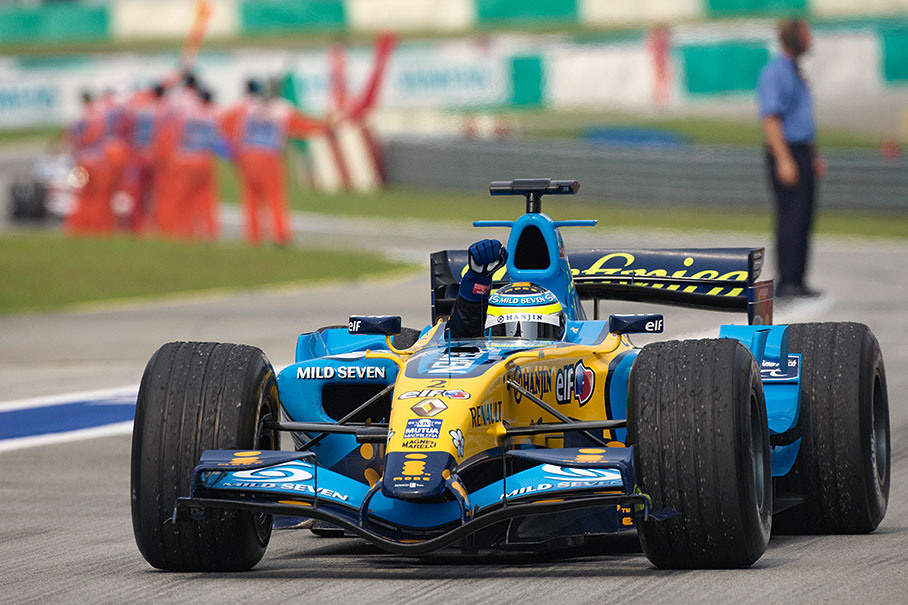 Winner Giancarlo Fisichella shaking his fist on his way to parc ferme
